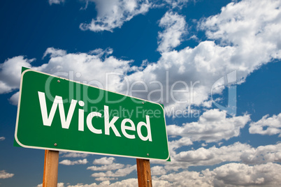 Wicked Green Road Sign with Sky