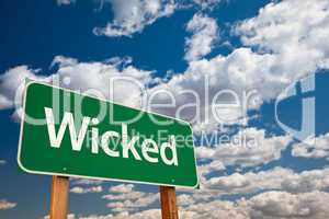 Wicked Green Road Sign with Sky