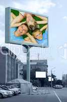 happy family on outdoor billboard
