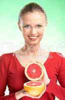 young beauty woman with grapefruit