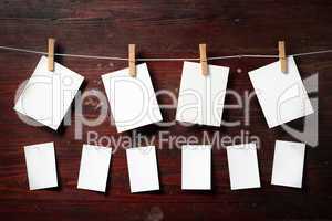Photo paper attach to rope with clothes pins