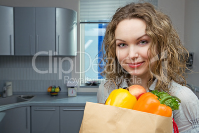 Beautiful woman in kitchen