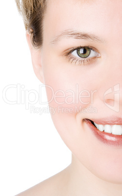 close-ups Half face girl looks in staff and widely smiles a white teeth