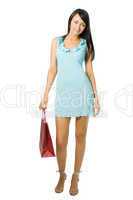 Shopping woman in blue with red package