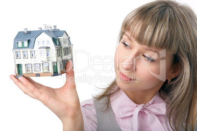 woman with little house on hand