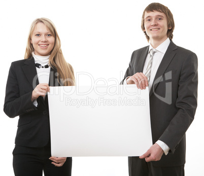 two young business people show white sign