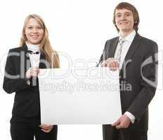 two young business people show white sign