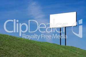 blue sky  green grass clouds and white bill board