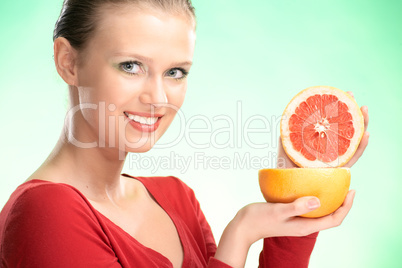 young beauty woman with grapefruit