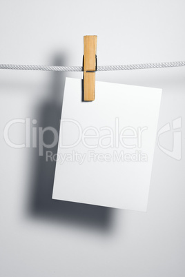white paper blank on rope