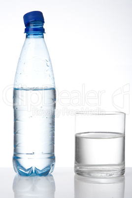 bottle and glass with water