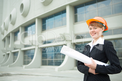 woman architect holding roll