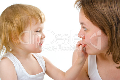 mother an baby in bed