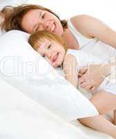 mother an baby in bed