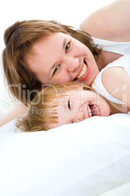 mother an baby in bed