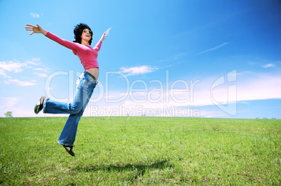 happy woman jump in field