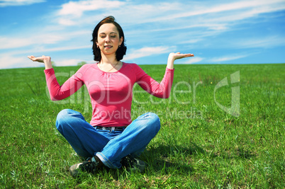 woman in field hold hand palm up