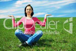 woman in field hold hand palm up