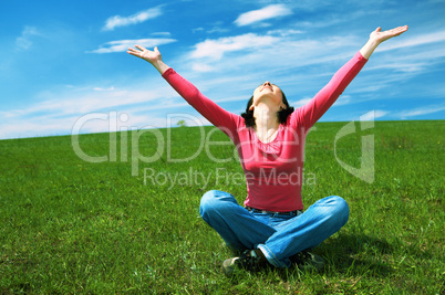 woman in field hold hand palm up