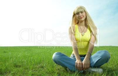 woman in field hold hand palm up
