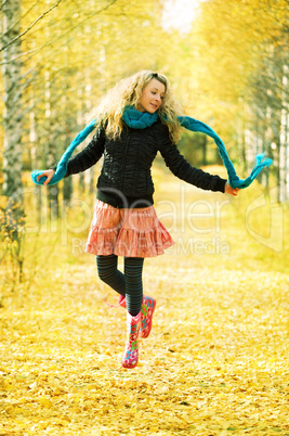 young woman in autumn forest