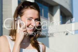 beauty sexy girl with sunglass speack mobile phone