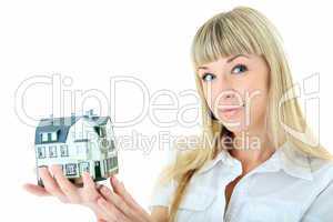beauty blonde woman with little house on hand