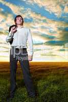 young businessman in field