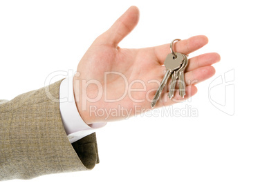 businessman hand holding key to success