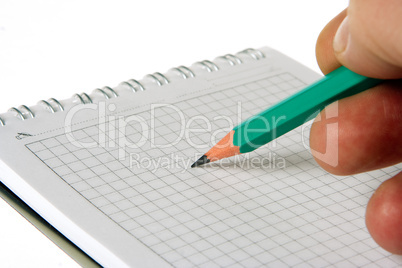 man hand write pencil in notebook