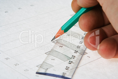 man hand write pencil on graph