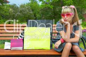 shopping blond woman in pink glass