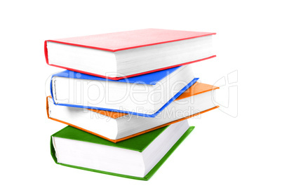 pile colors books on white