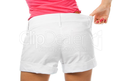 thin waist woman in big shorts