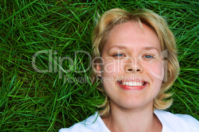 woman lie on grass
