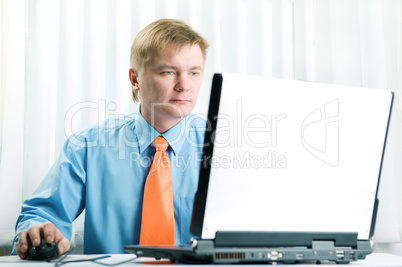 Young  businessman with laptop