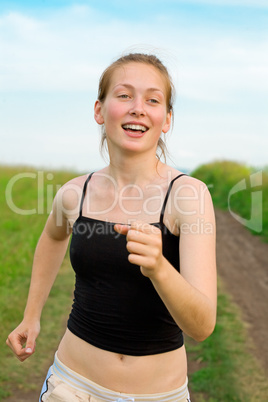 woman run on green grass