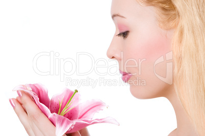 Beauty blonde spa girl with pink lily