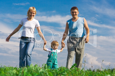 family under blue sky