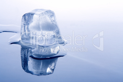 brick of ice on blue