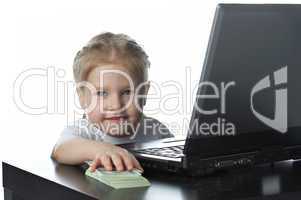 little girl with laptop and money