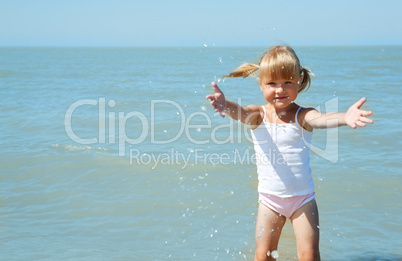 little girl child on the sea