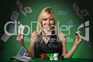 Poker player in casino with cards and chipsv