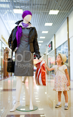 young little girl in shopping mall