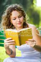 Beauty woman reading a book