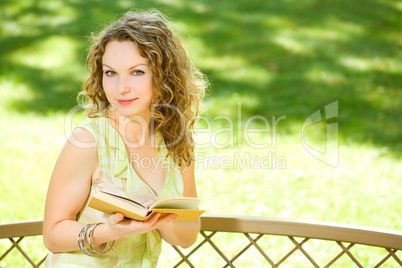 Beauty woman reading a book