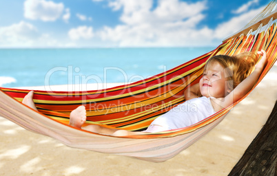 child relaxing in a hammock