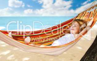 child relaxing in a hammock