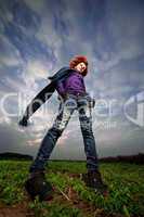 beauty redhaired girl in field