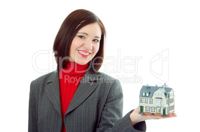 woman hold little house on hand